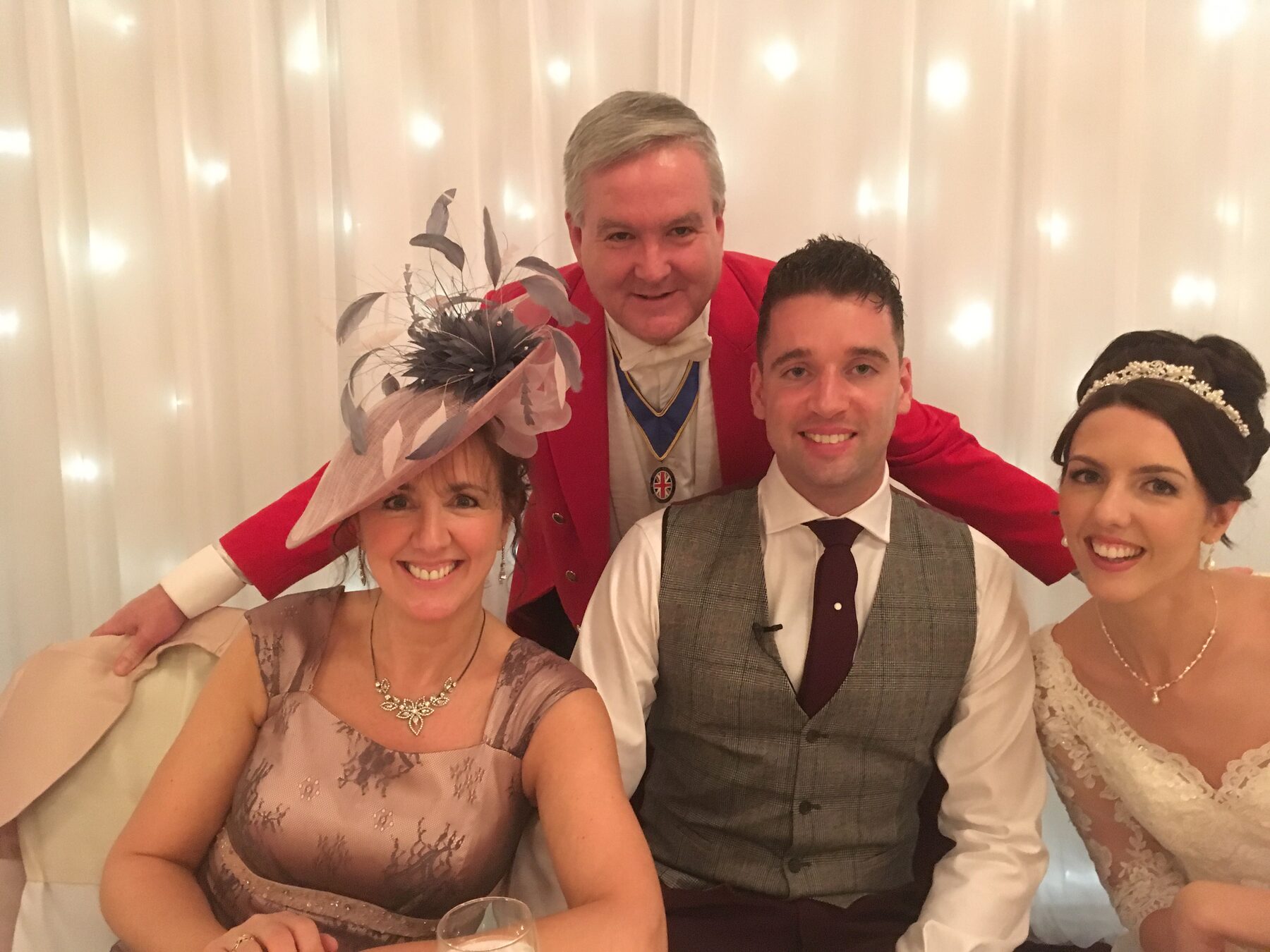 Andrew Morgan with family members at a wedding reception