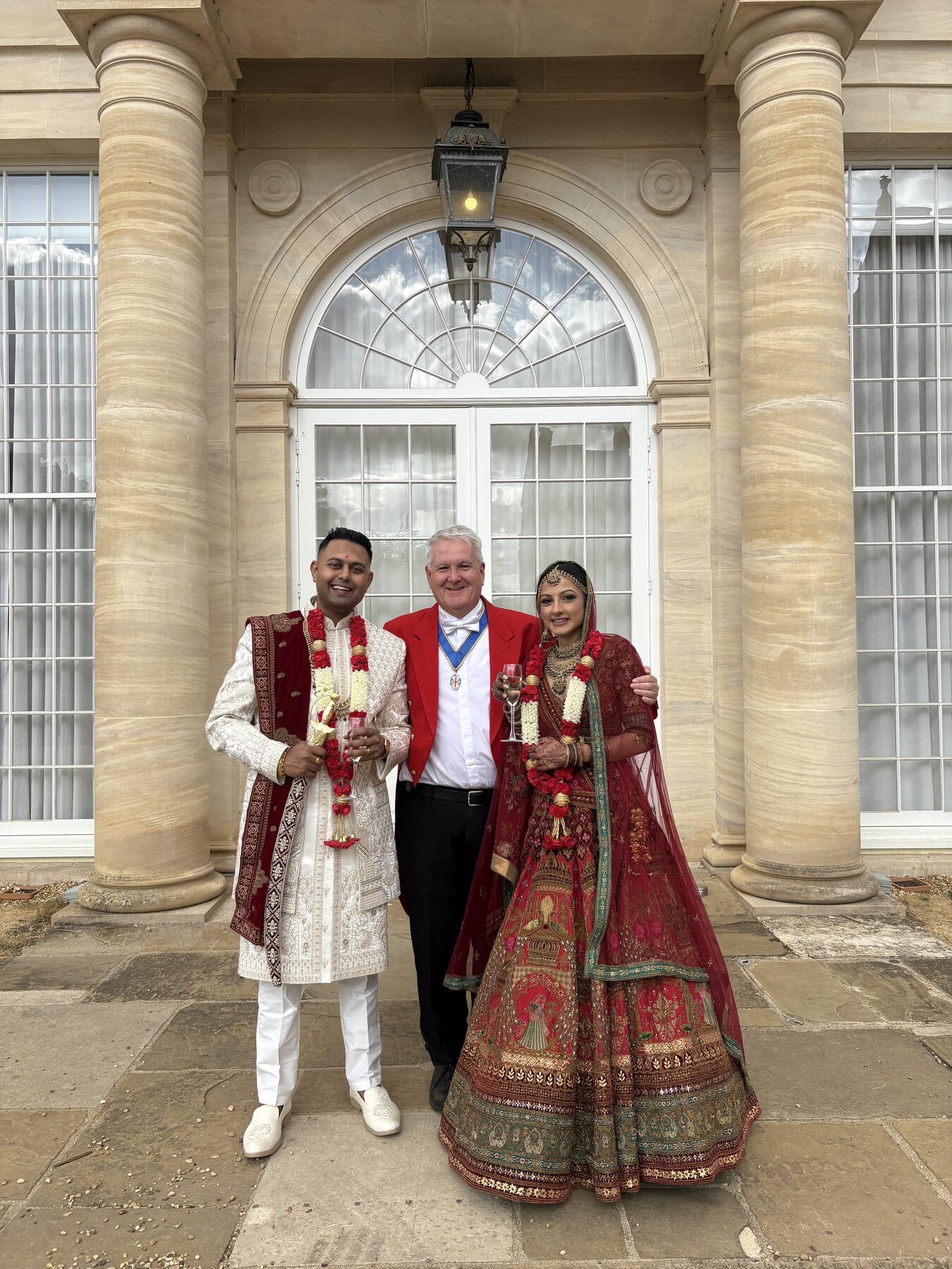 Andrew Morgan with a couple at their wedding, working alongside the day's other suppliers